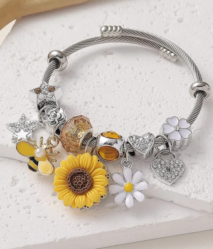 Pulsera elegante y dulce aleación de acero de titanio en amarillo y plateado