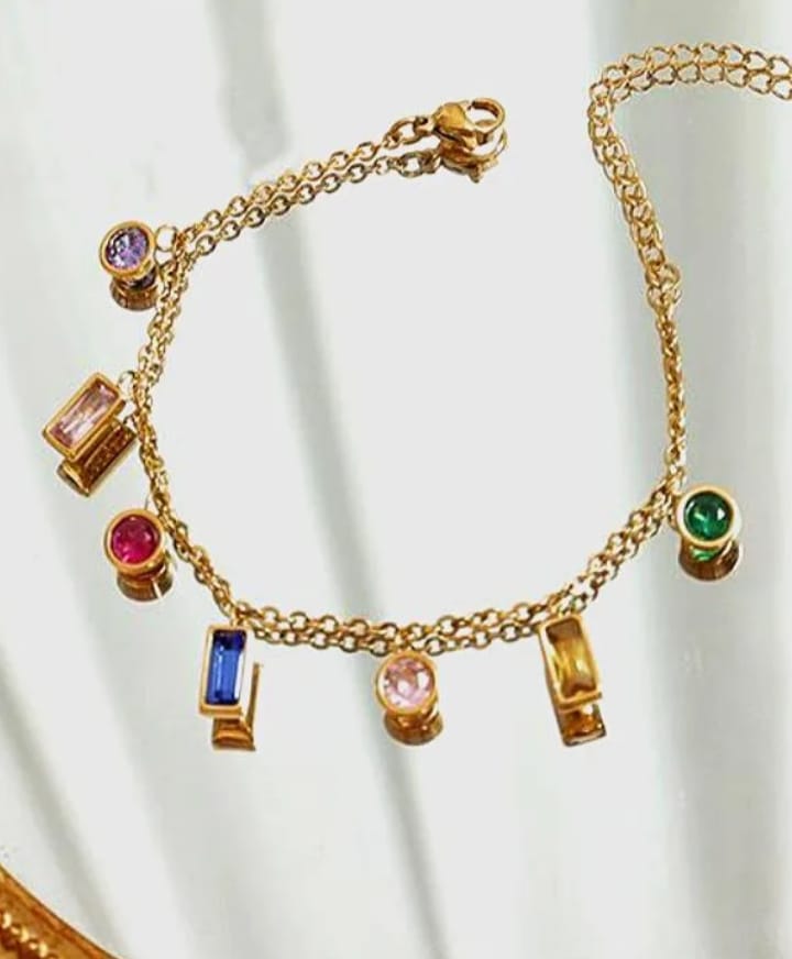 Pulsera elegante y delicada en acero de titanio chapada en oro de 18 k vidrio circón