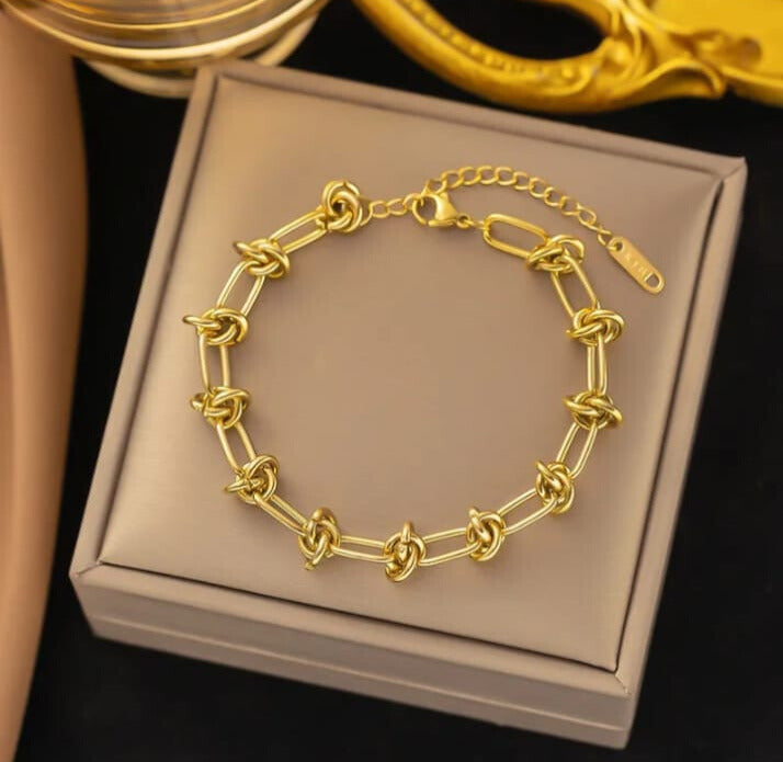 Pulsera diseño geométrico de acero inoxidable 304 enchape en oro de 18 k en dorado